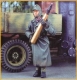 35;German soldier wearing coat, with grenade